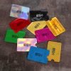 a group of colorful plastic cards
